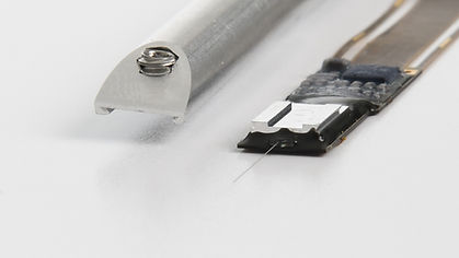 Neuropixels 1.0 dovetail holder next to probe (1).jpg